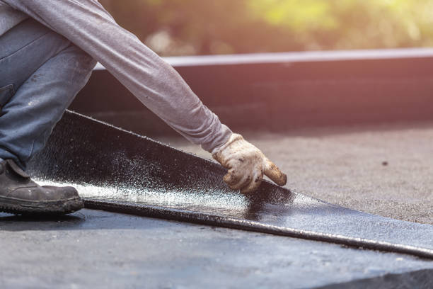 Professional Basement Waterproofing technician working in Maywood, NJ